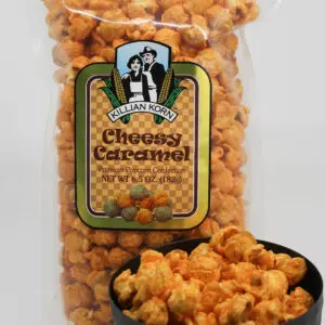 Cheesy Caramel Popcorn in a black bowl and packet